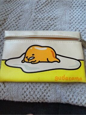 ME Makeover Essentials Cream Zip Pouch with Gold 'meh...' Charm